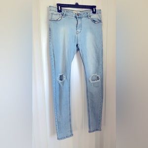 Encore knee ripped jeans. These jeans are form fitting